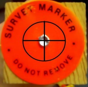 Attach the Tribrach and Coarse Level the Tripod Over the Benchmark.