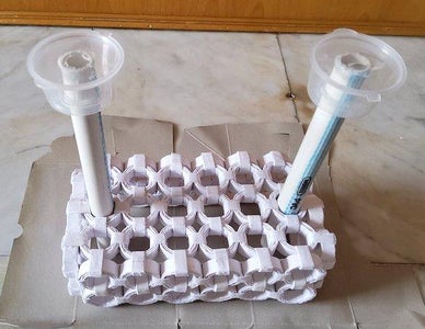 Inserting Water Pipe Into the Container