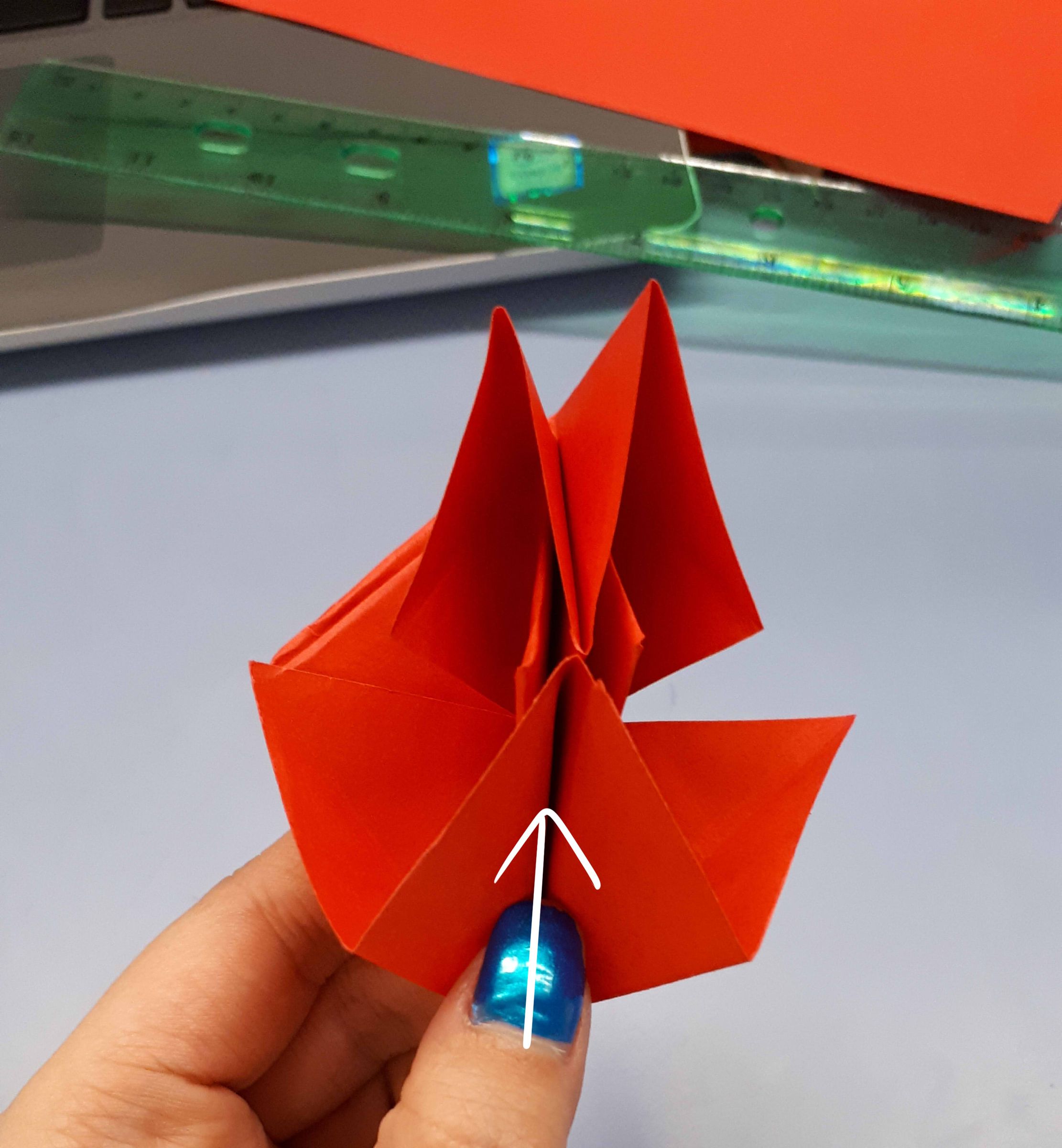 Step 8: Push the Triangles Down and Flip