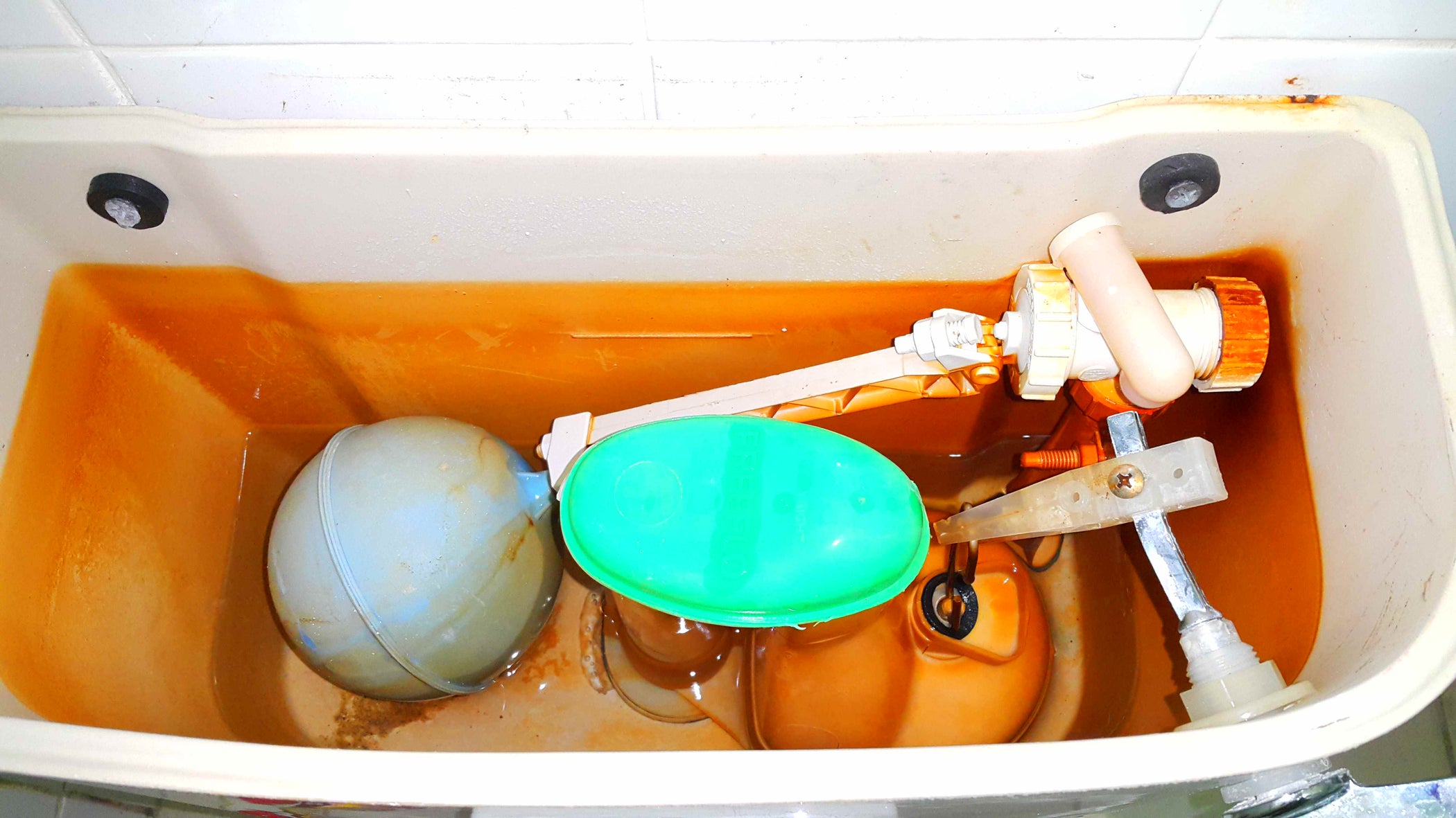 Replacing a Toilet Tank Float Valve. 6 Steps (with Pictures