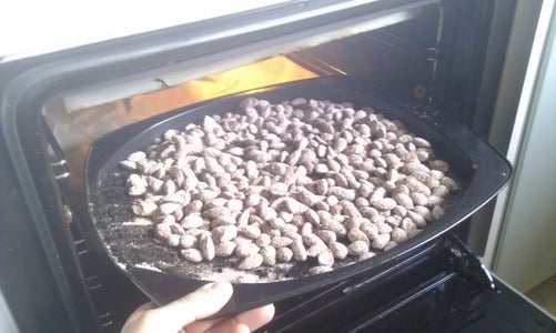 Remove Pan and Heat Almonds