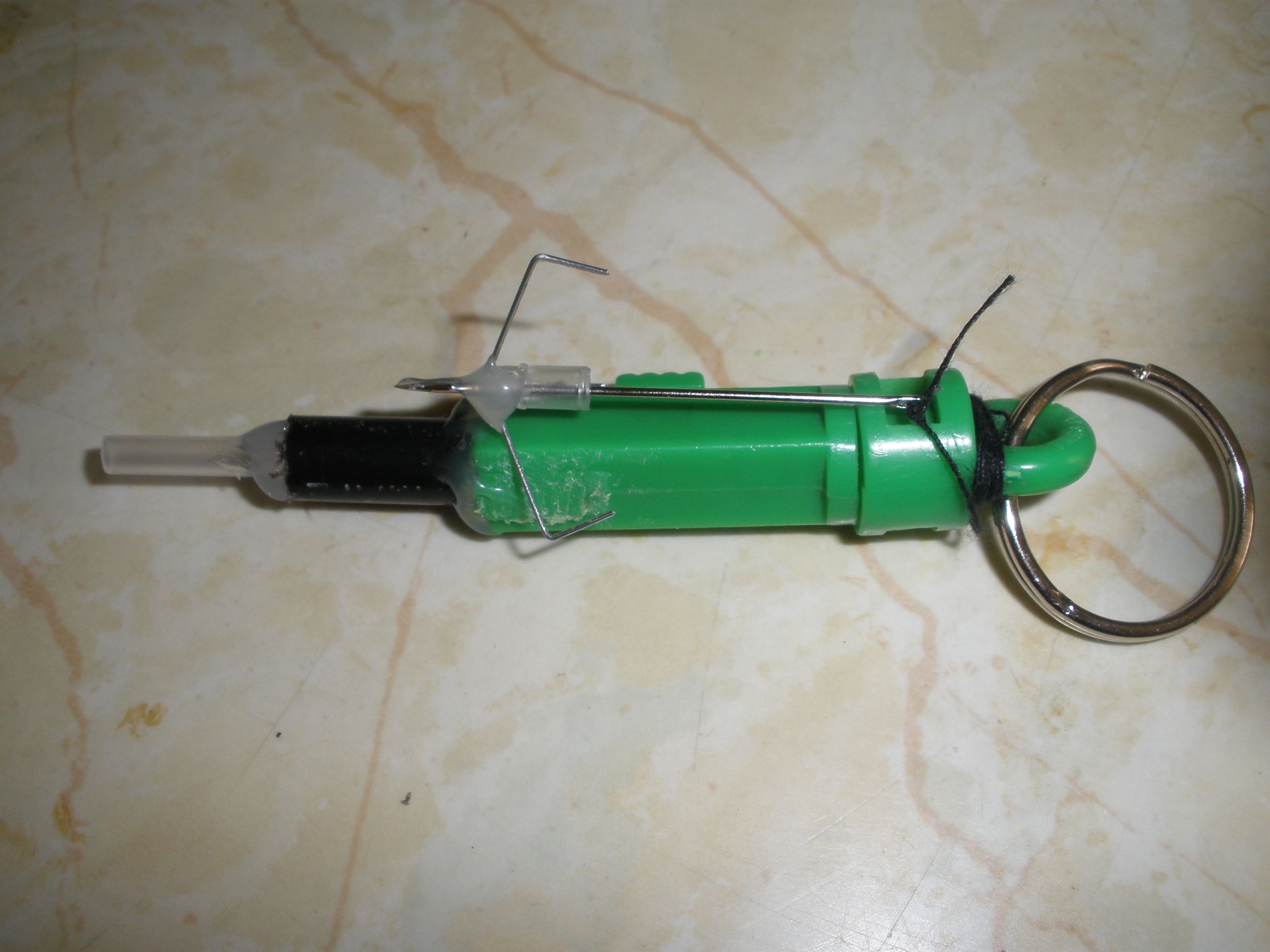 Pocket sized grapple gun