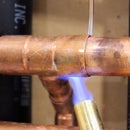 How to Solder Copper Pipe in a Wall