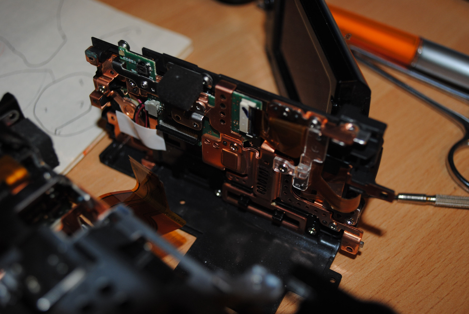 How to Replace the LCD Flex Cable for Canon HF11 Camcorder 4 Steps