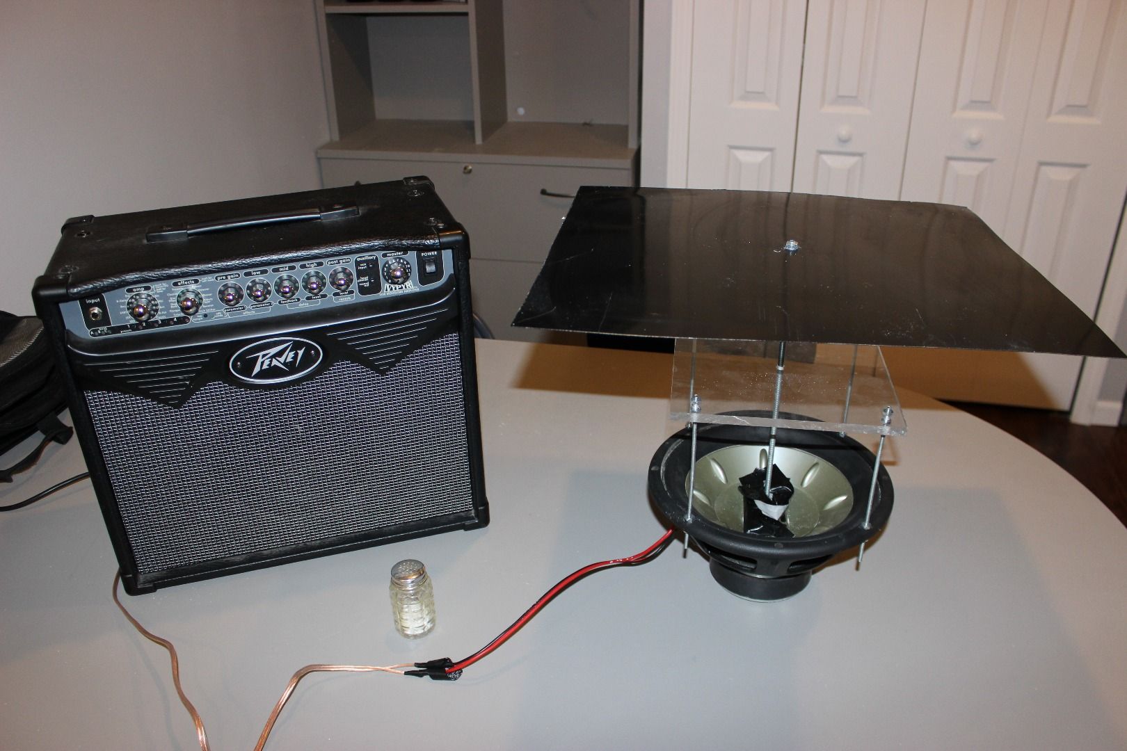The finished rig — plate on rod on subwoofer