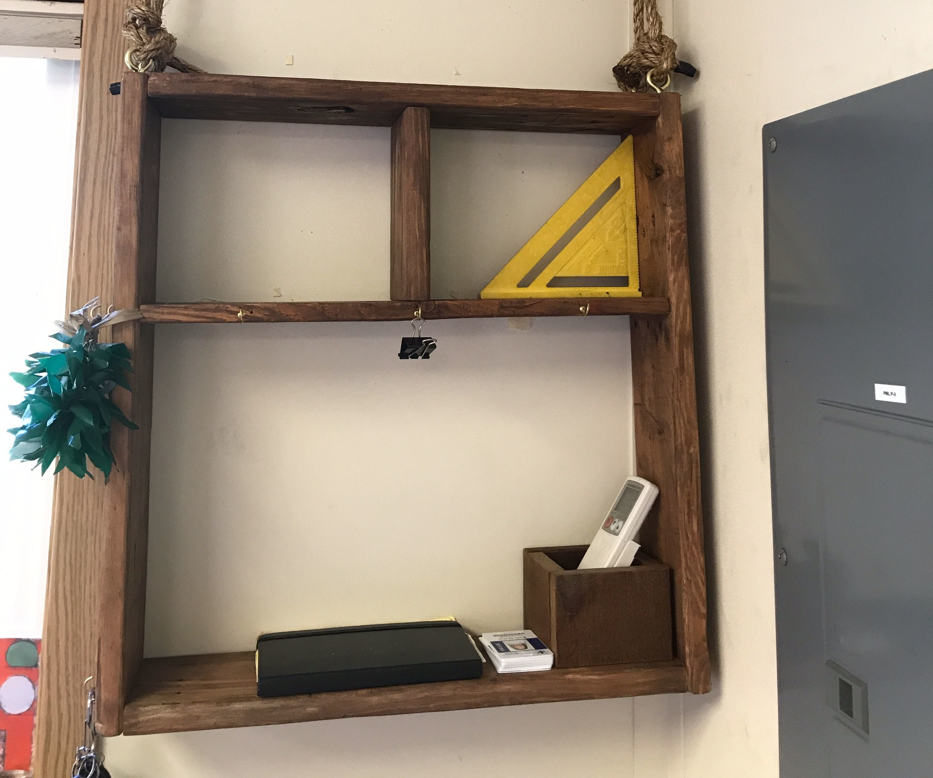 Hanging shelf out of re-used wood