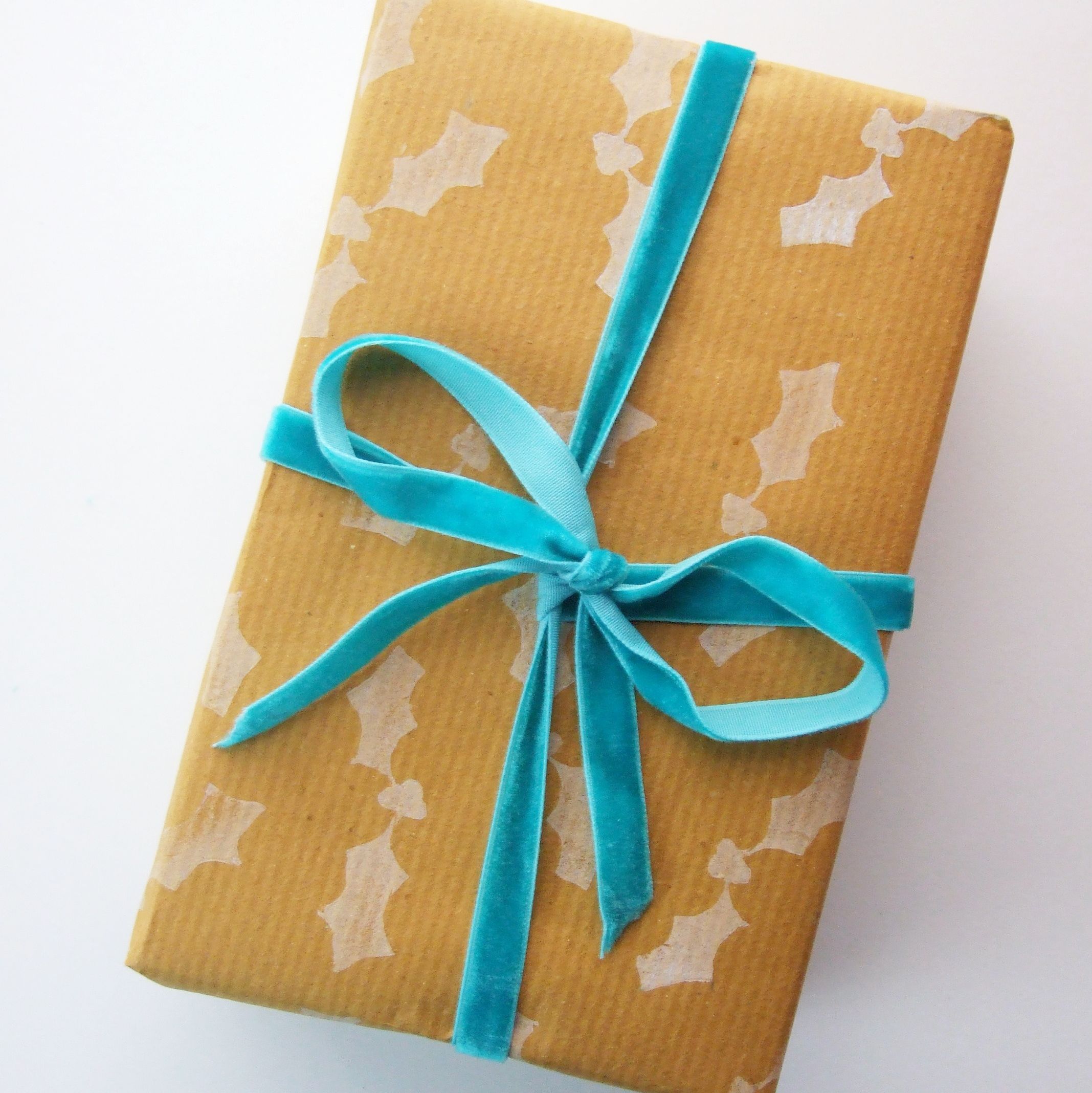 Hand Stamped Diy Holly Wrapping Paper.