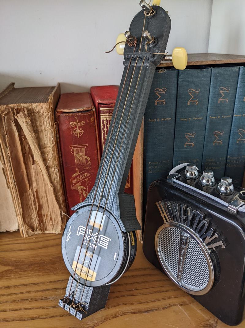 How to Play the Wax Tin Guitar