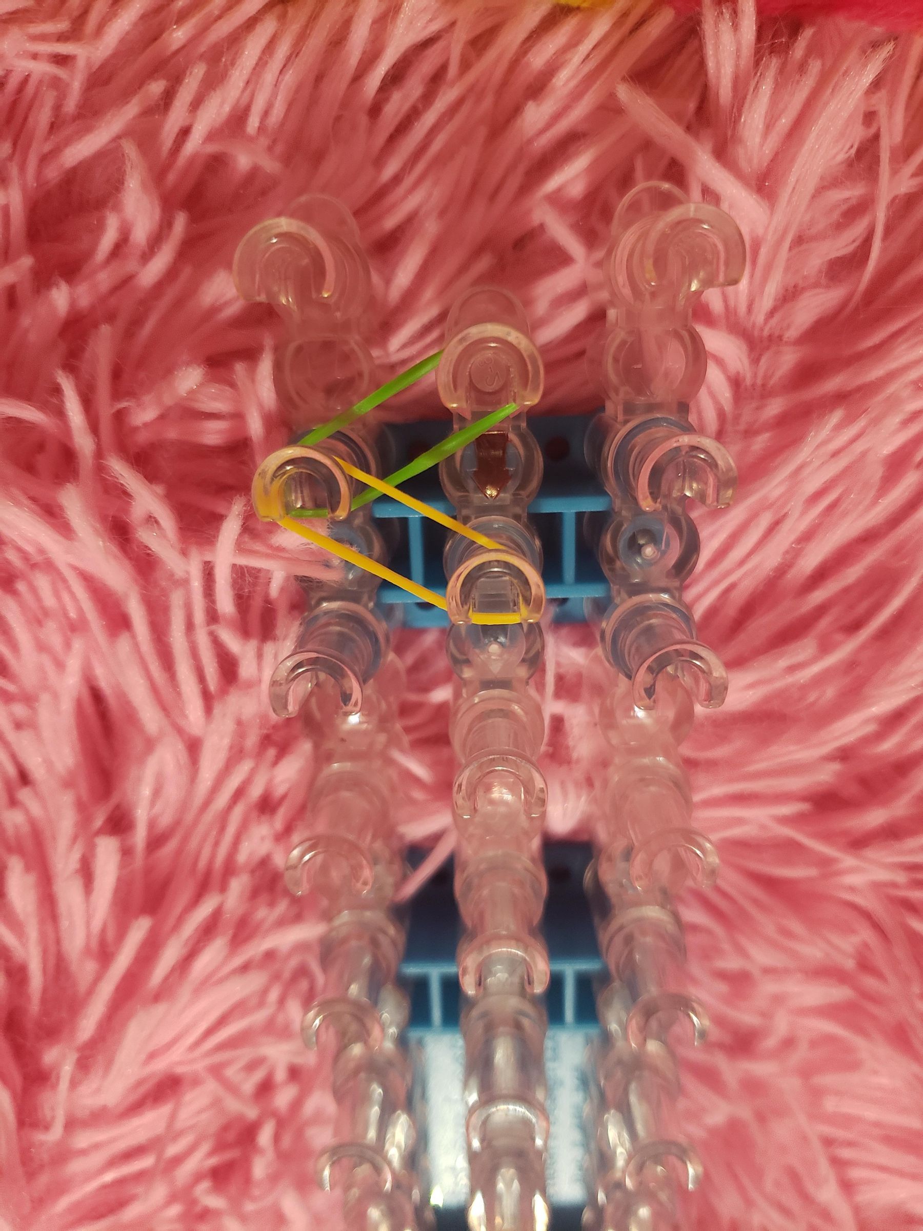 How to Make a Single Rubber Band Bracelet on Loom. 3 Steps