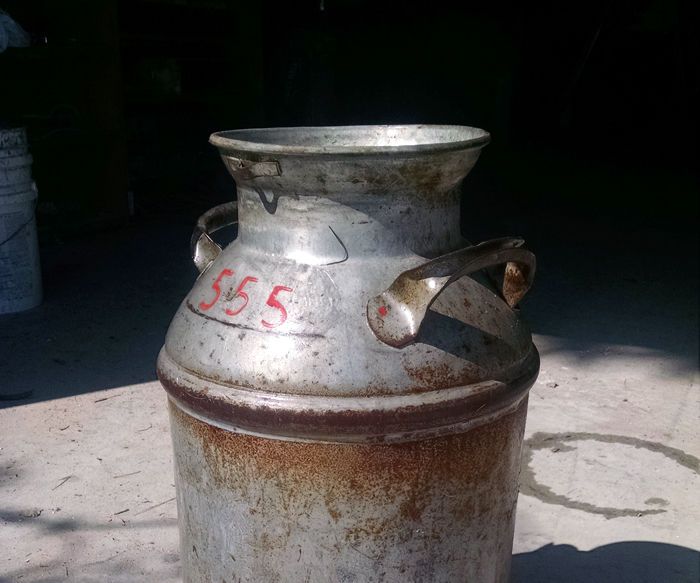 An Old Milk Can Recycle Into an Outdoor End Table!