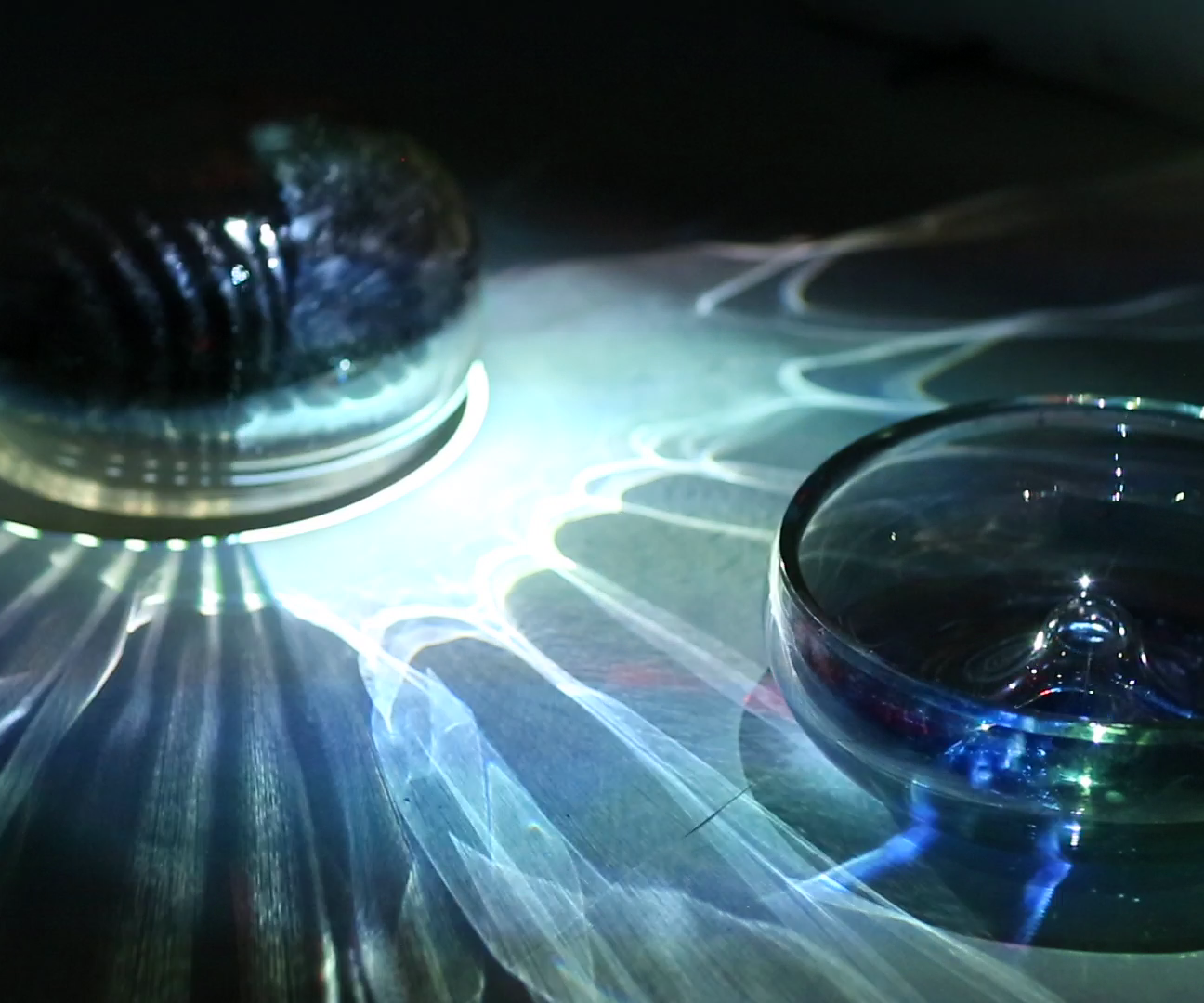 One to Hold, One to Echo: a Performance in Glass, Video, and Music