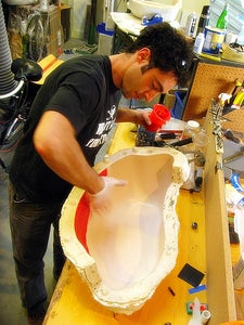 Mold Complete. Begin Lay Up by Painting and Smearing Gel Coat Inside the Left and Right Halves of the Mold.