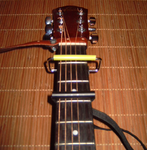A Guitar Strap and 2 Capos for the Poor Man