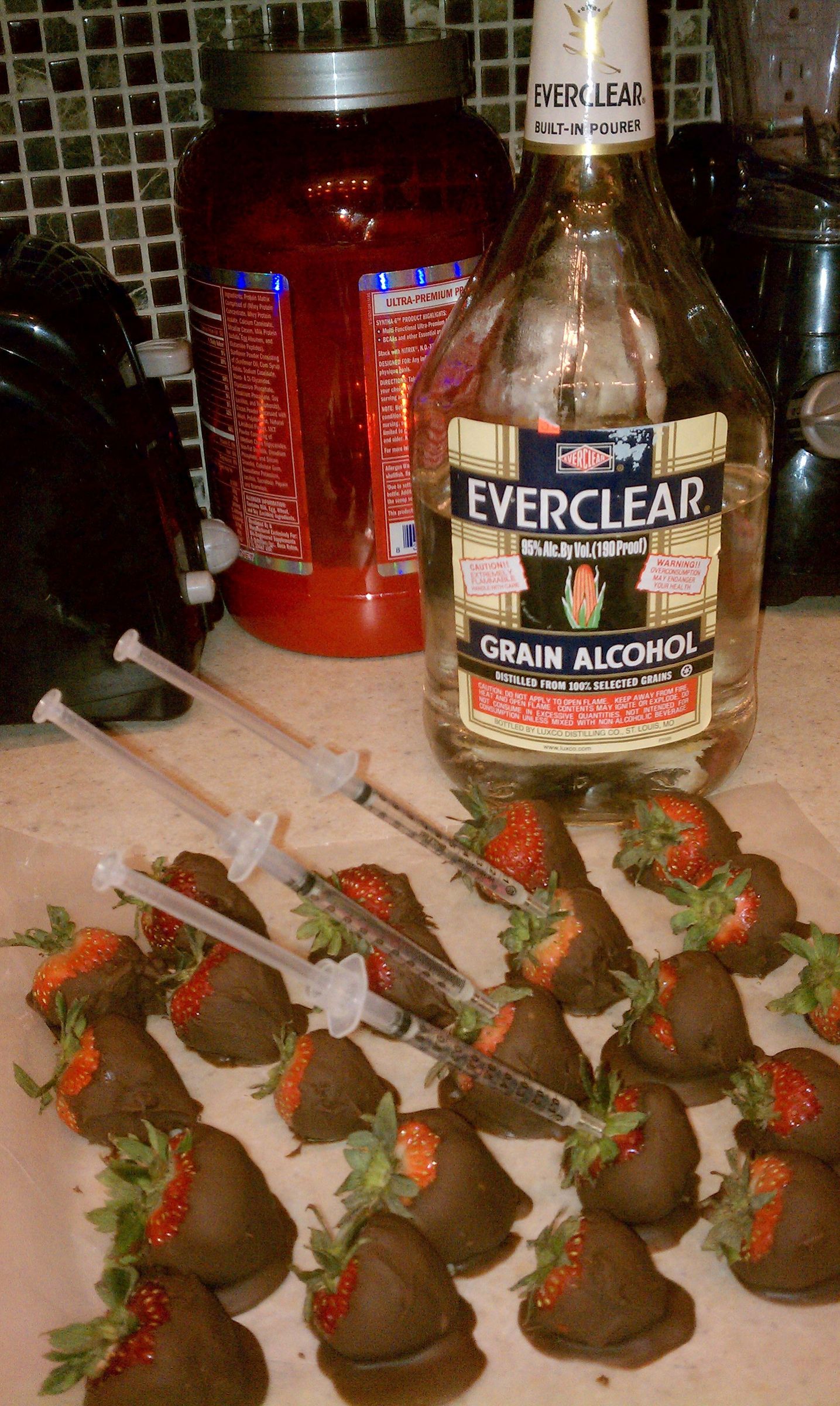 The New Age of Fruit and Alcohol. Chocolate Dipped Strawberries Injected With Alcohol. Perfect