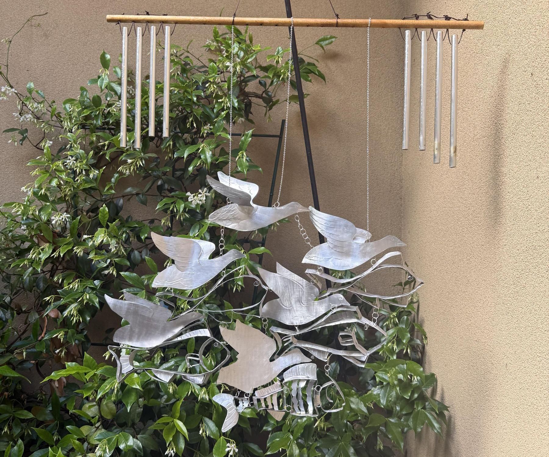Turning Soda Cans Into Escher-Inspired Wind Chimes