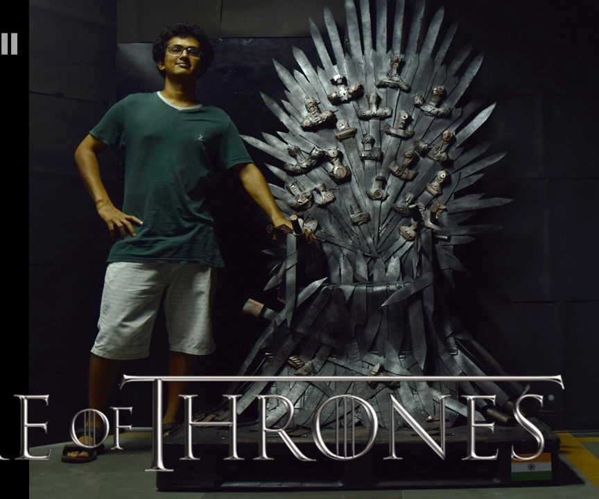 A full scale Iron Throne replica out of cardboard and (un)used chair 