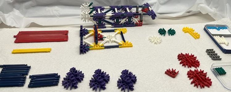 Expand the Main Arm Assembly