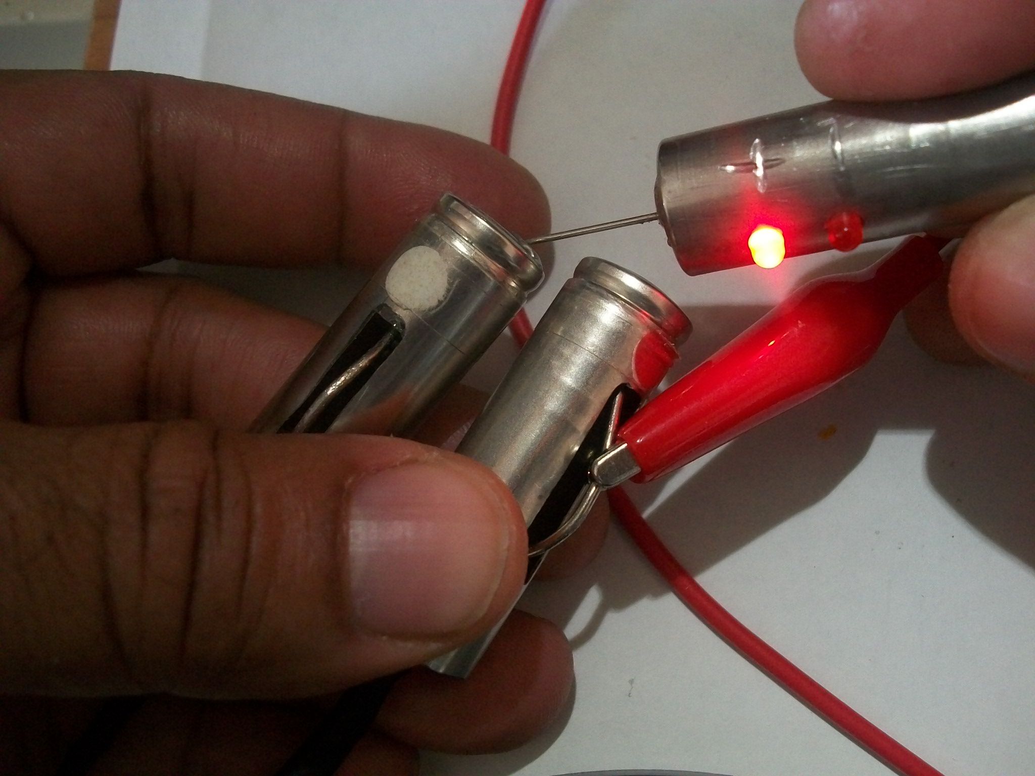 How to make a polarity tester out of a AA battery