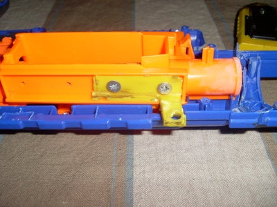 Relocating the Cocking Mechanism