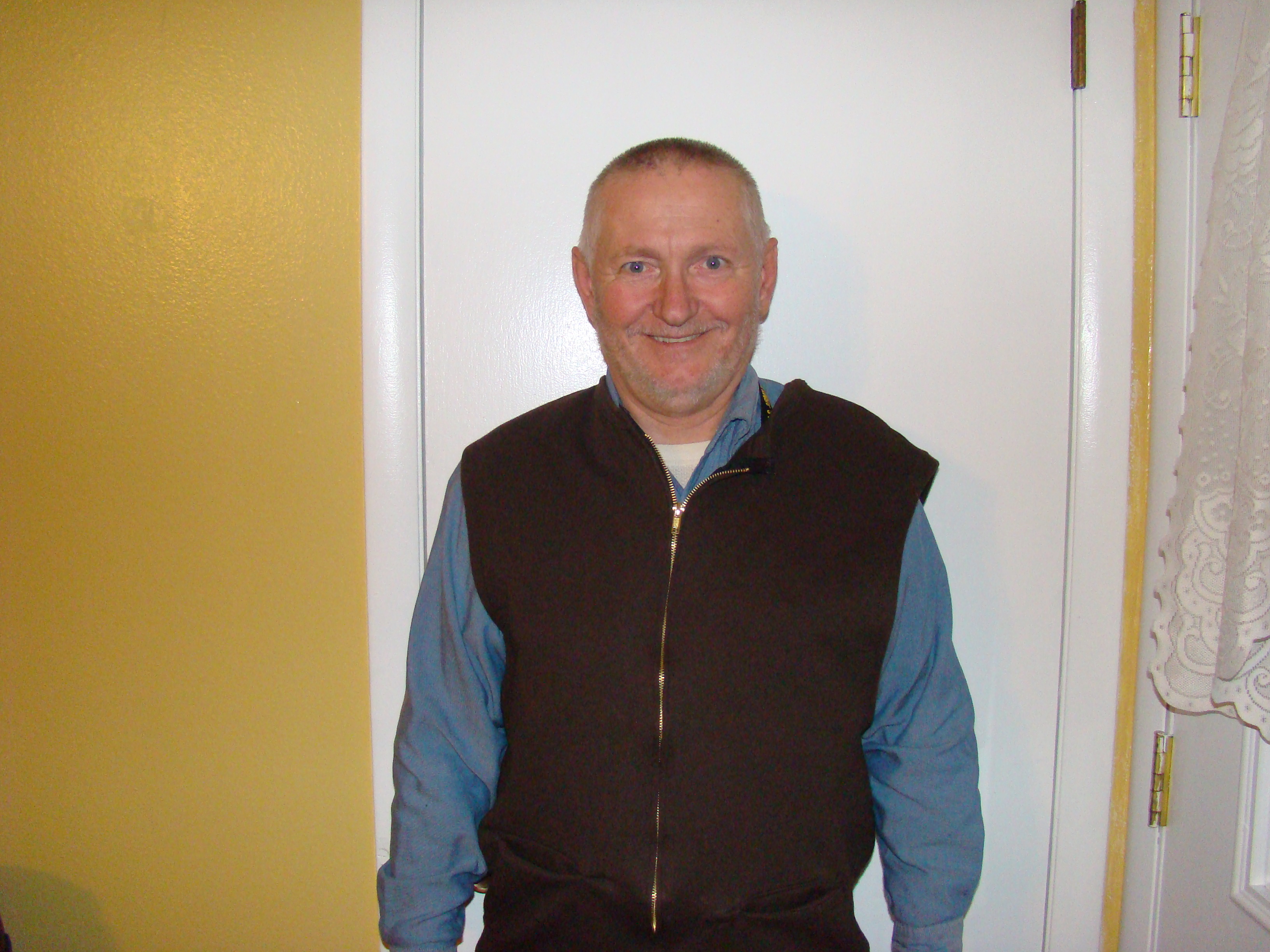 How to Create a Warm Vest Out of a Sweat Shirt