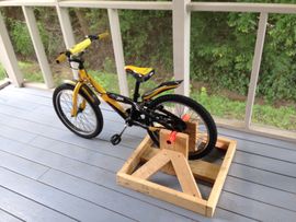 stand to make bicycle stationary Alpcour Bike Trainer for Indoor Riding  Portable Foldable Magnetic Stainless Steel Indoor Trainer, Noise Reduction, 6 Resistance Settings & Bag  Exercise for Road & Mountain Bikes Features protective silicone cushioning to safeguard the bike and hooks to hang a helmet or other accessories Stationary Bike Stand for Kids