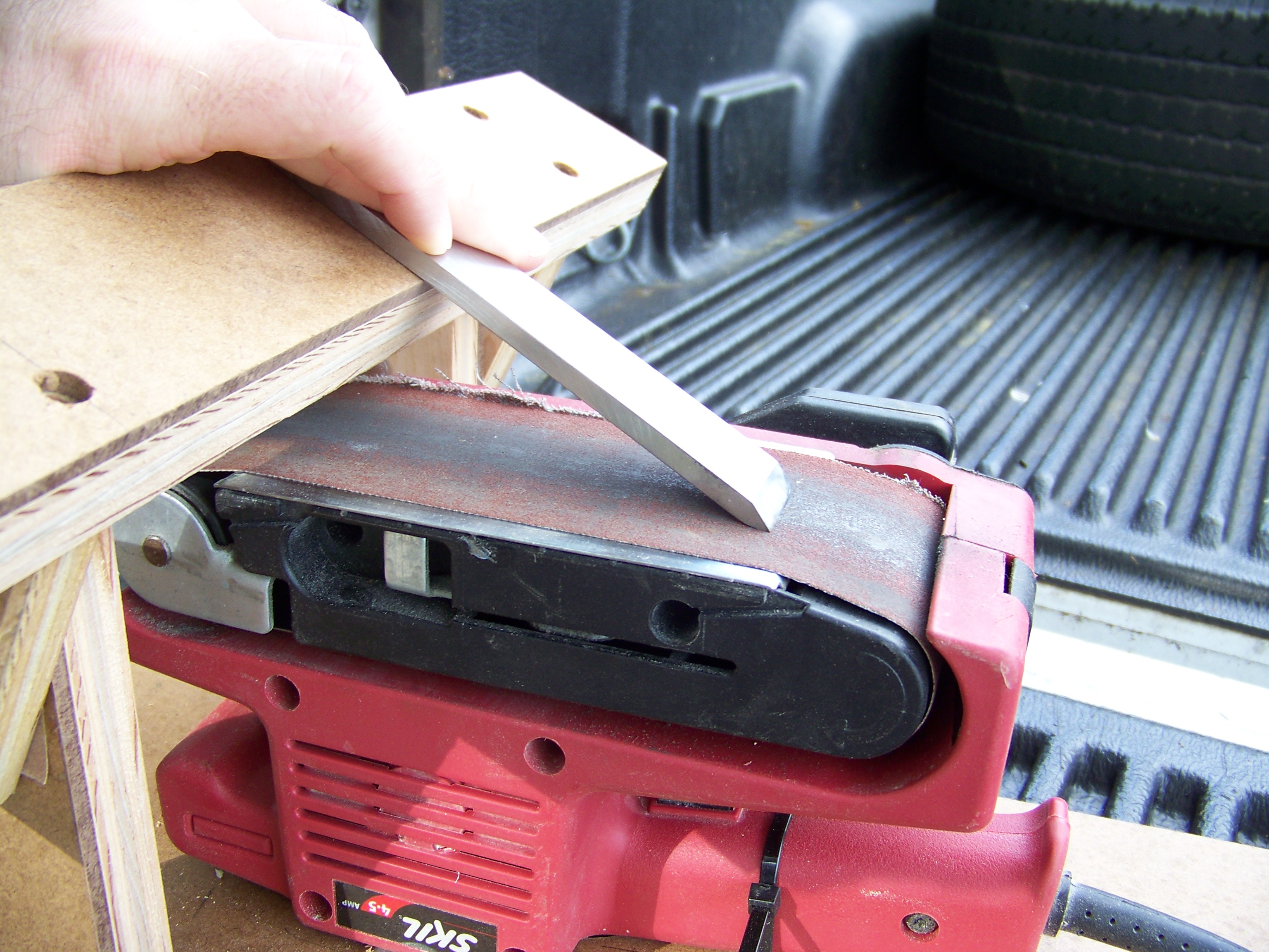 Tool Rest for a Belt Sander for Sharpening Instructables