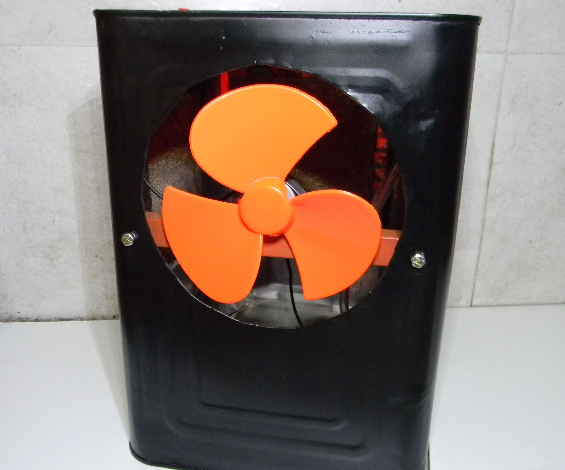 Portable Air Cooler, Made Out of an Old Metal Oil Can. 