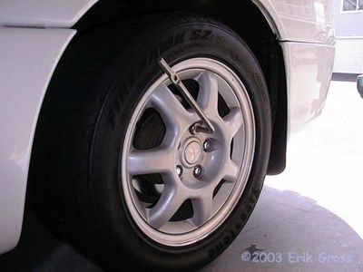 Loosen Lug Nuts With Socket Wrench