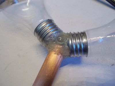 Glue the Light Bulbs to the Copper Pipes