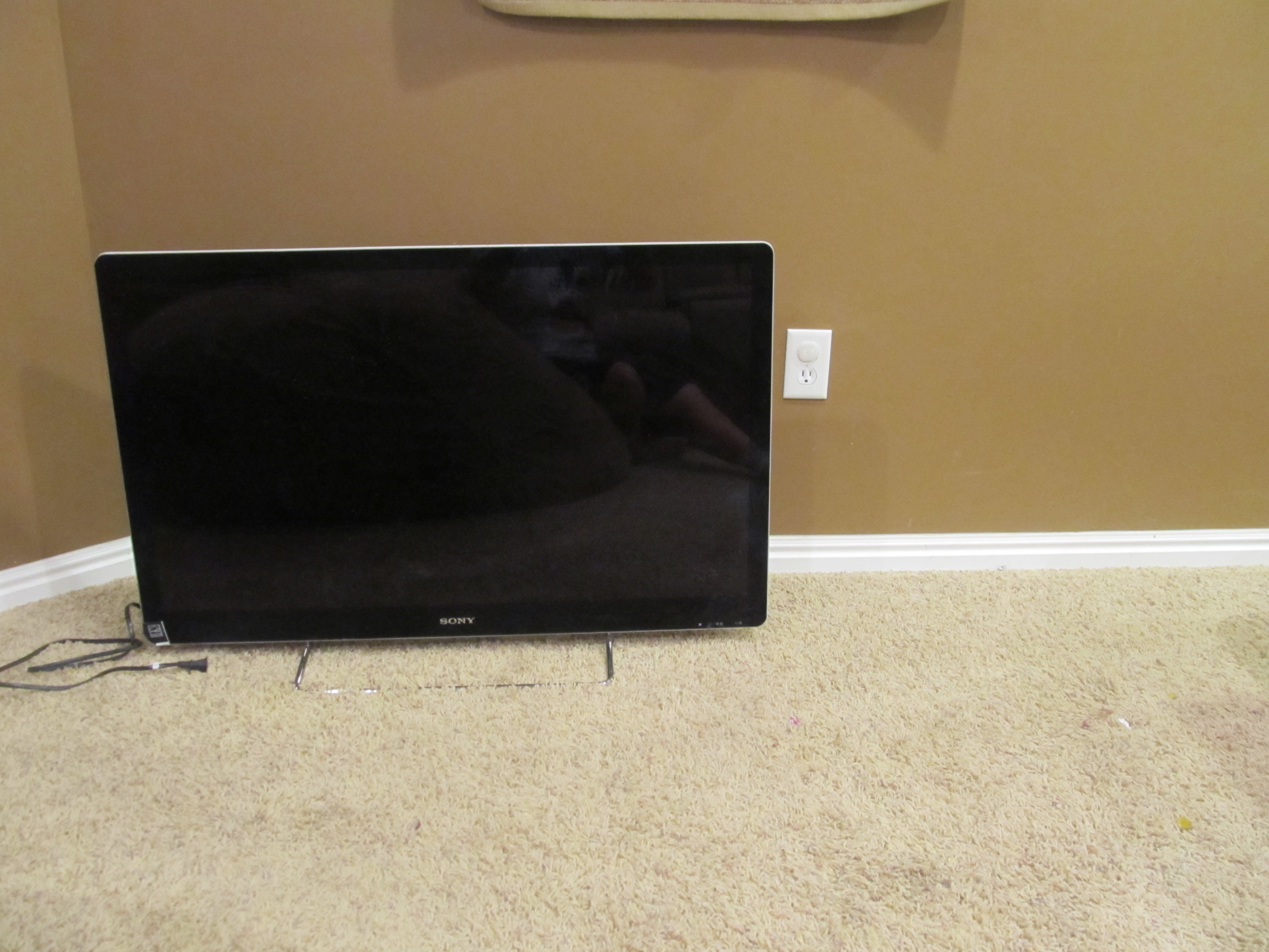 HOW TO RETRO-FIT AN OUTLET BEHIND a WALL MOUNT TELEVISION