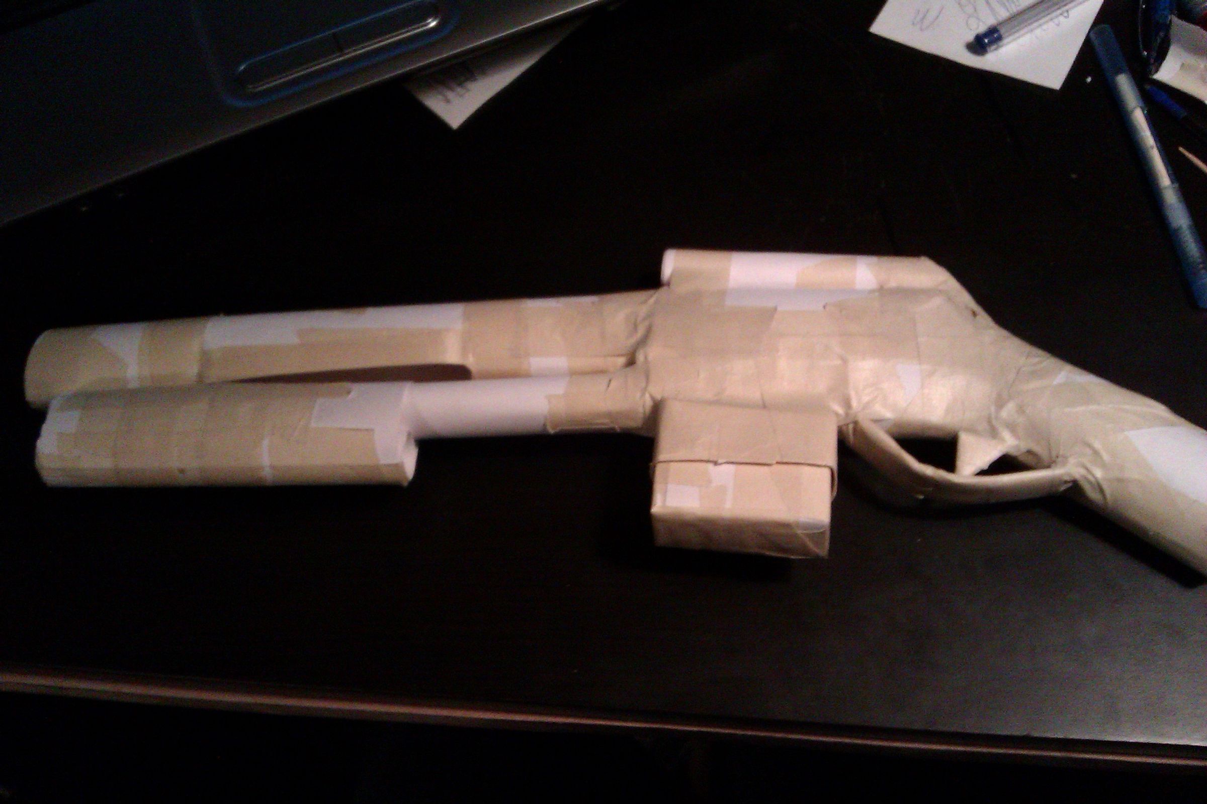 Paper and tape shotgun