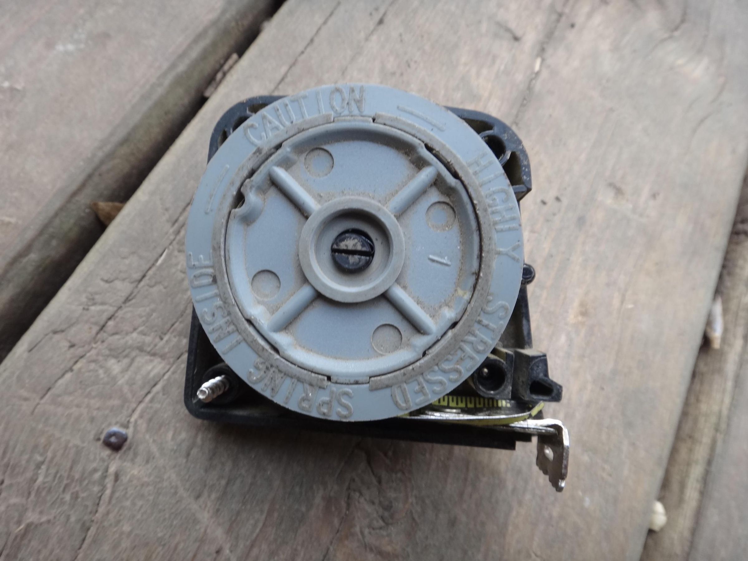 How to Fix a Measuring Tape That Won't Retract (Broken Spring) 5