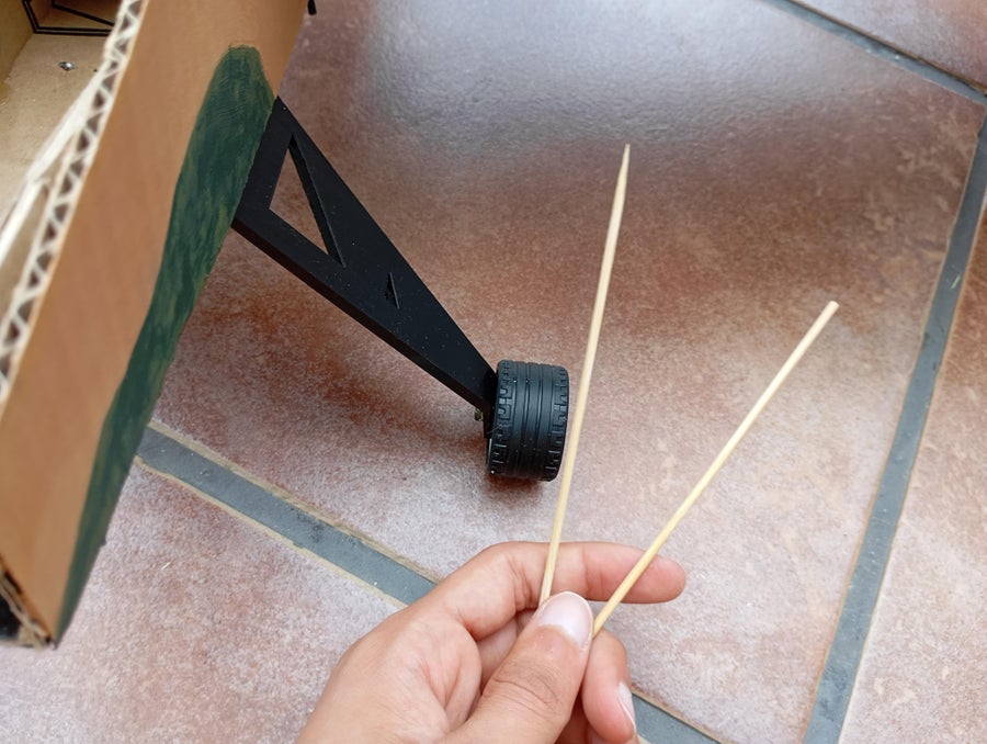 Securing Wings With Skewers and Rubber Bands