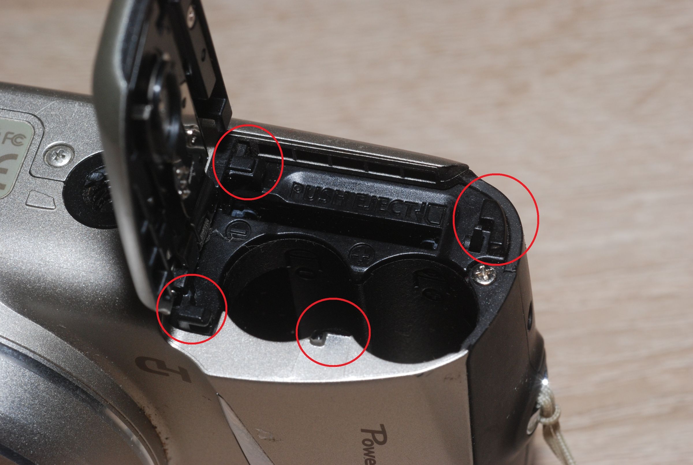 Replacement of Canon PowerShot SX130IS Battery Compartment Door 4
