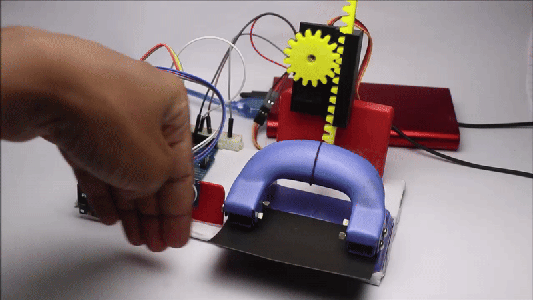 Automatic Paper Hole Punch Device Using Arduino