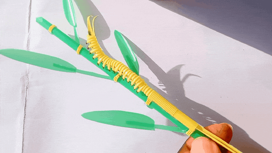 Playing With the Bamboo Crawling Caterpillar Toy