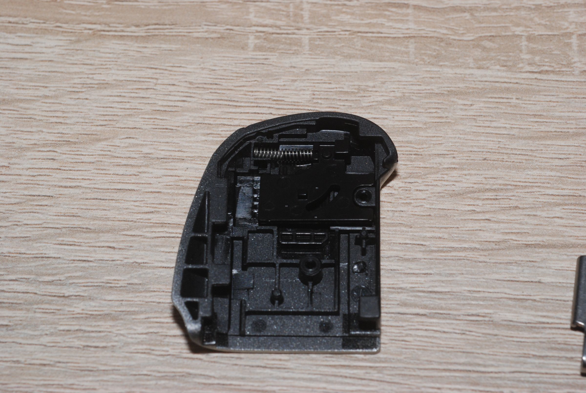 Replacement of Canon PowerShot SX130IS Battery Compartment Door 4