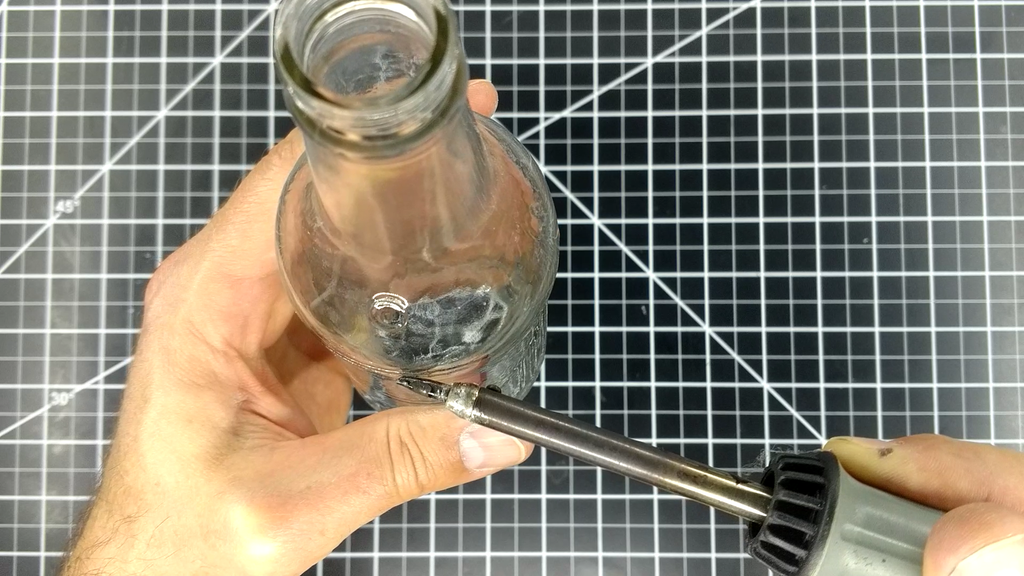 Cut a Hole in a Glass Bottle Using a Soldering Iron 7 Steps