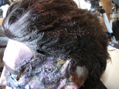 Cutting and Buring the Hair