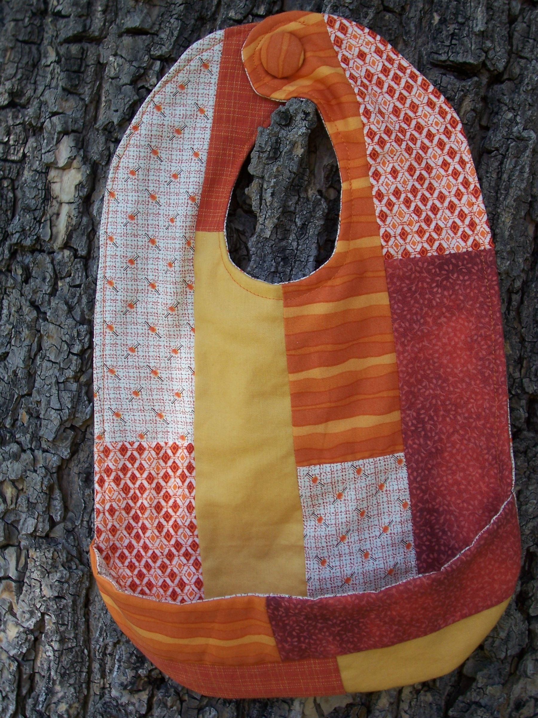 Reversible Quilted Bib With Pocket
