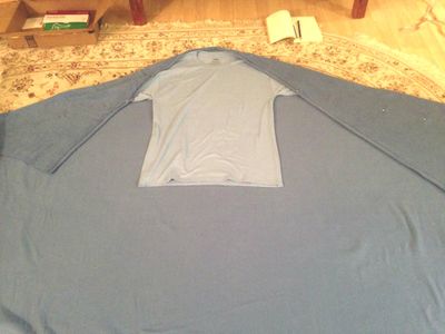 Make the Cape and Attach Feathers