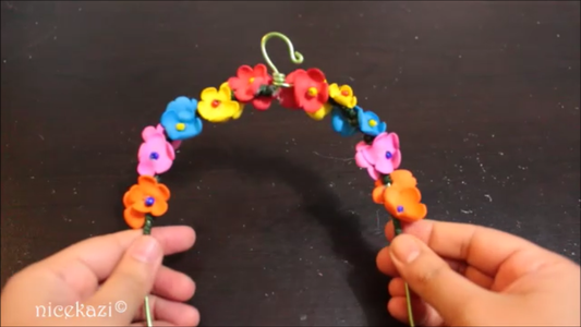 Wrapping the Swing With Flowers and Beads: