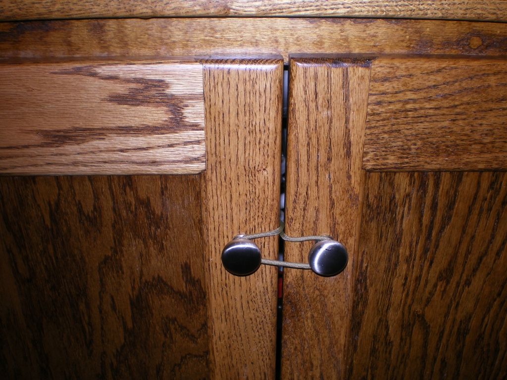 Kid Resistant (But Not Kid Proof) Cabinet Keeper-Shutters