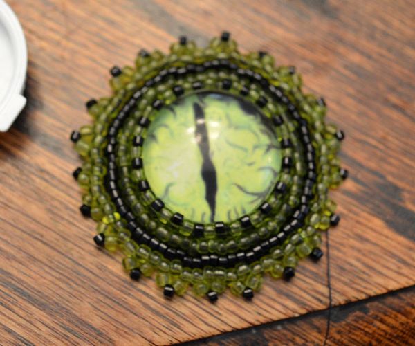 Green Dragon Eye Beaded Brooch Pin