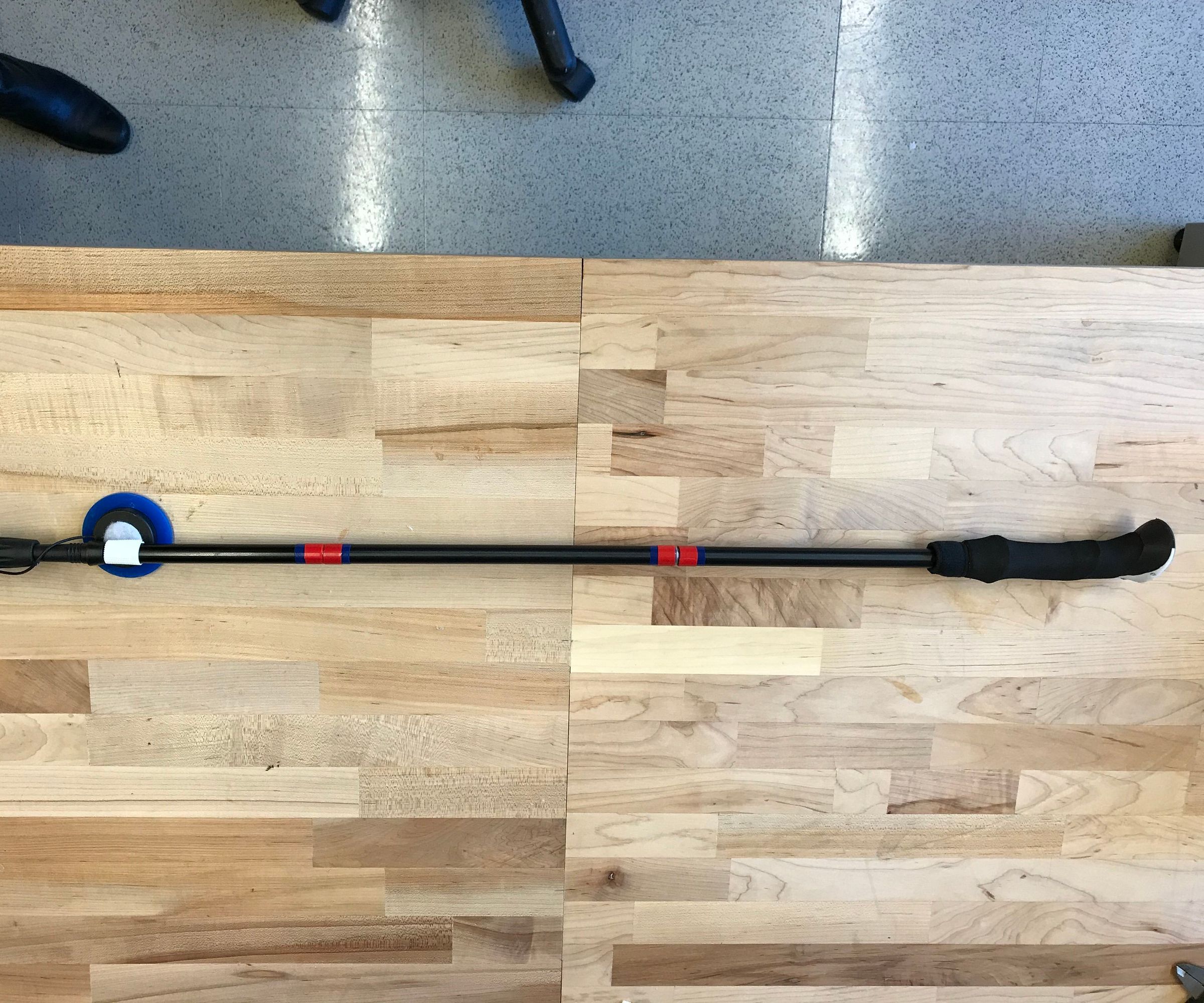 Assistive Technology Adhesive Picker Upper Device
