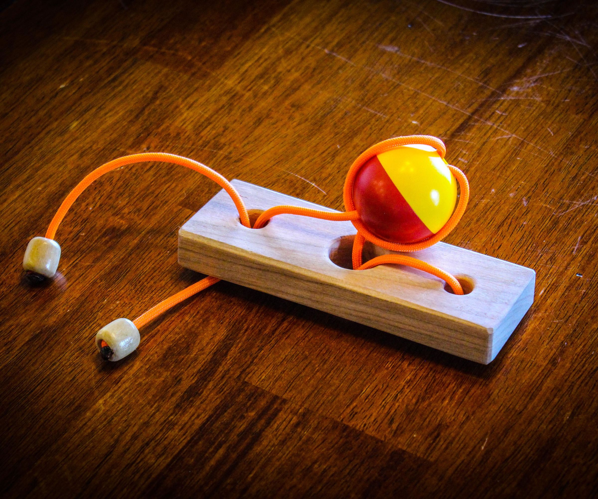 Ball and String Puzzle