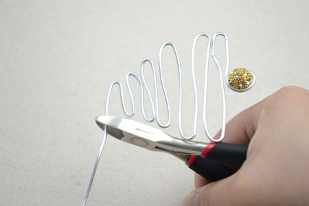 Keep a Length of 1cm Long at End of the Wire and Cut Off the Excess. You Can Also Adjust the Space Between Each Layer If You Feel That Your Design Is Not Straight Enough.