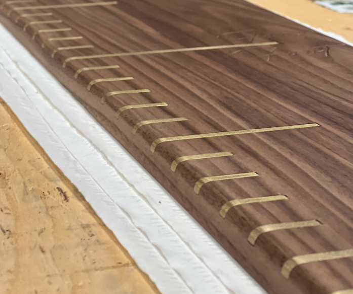 Walnut Growth Chart With Brass Inlays