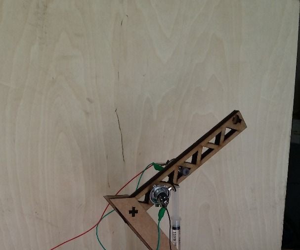 Lasercut Crane W. Automatic Hydraulics 8 Steps Instructables