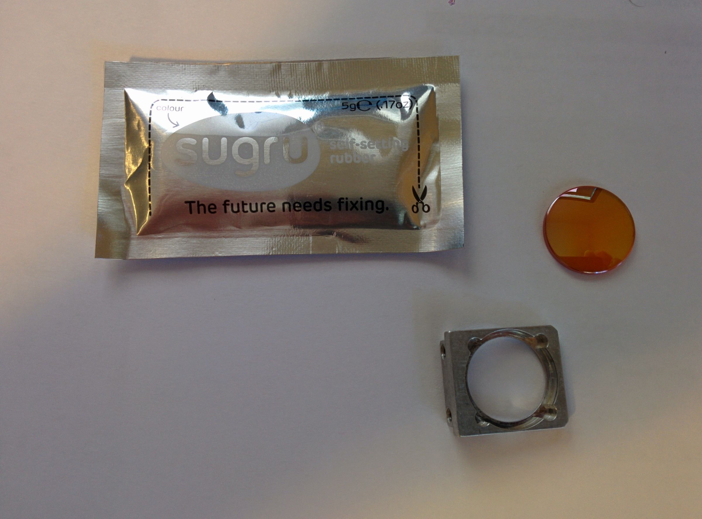 Repair a Universal Laser Cutter Lens Holder With Sugru! Instructables